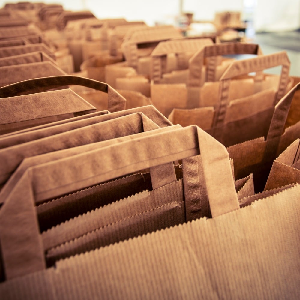 Shoppers personalizzate in carta riciclata monouso
